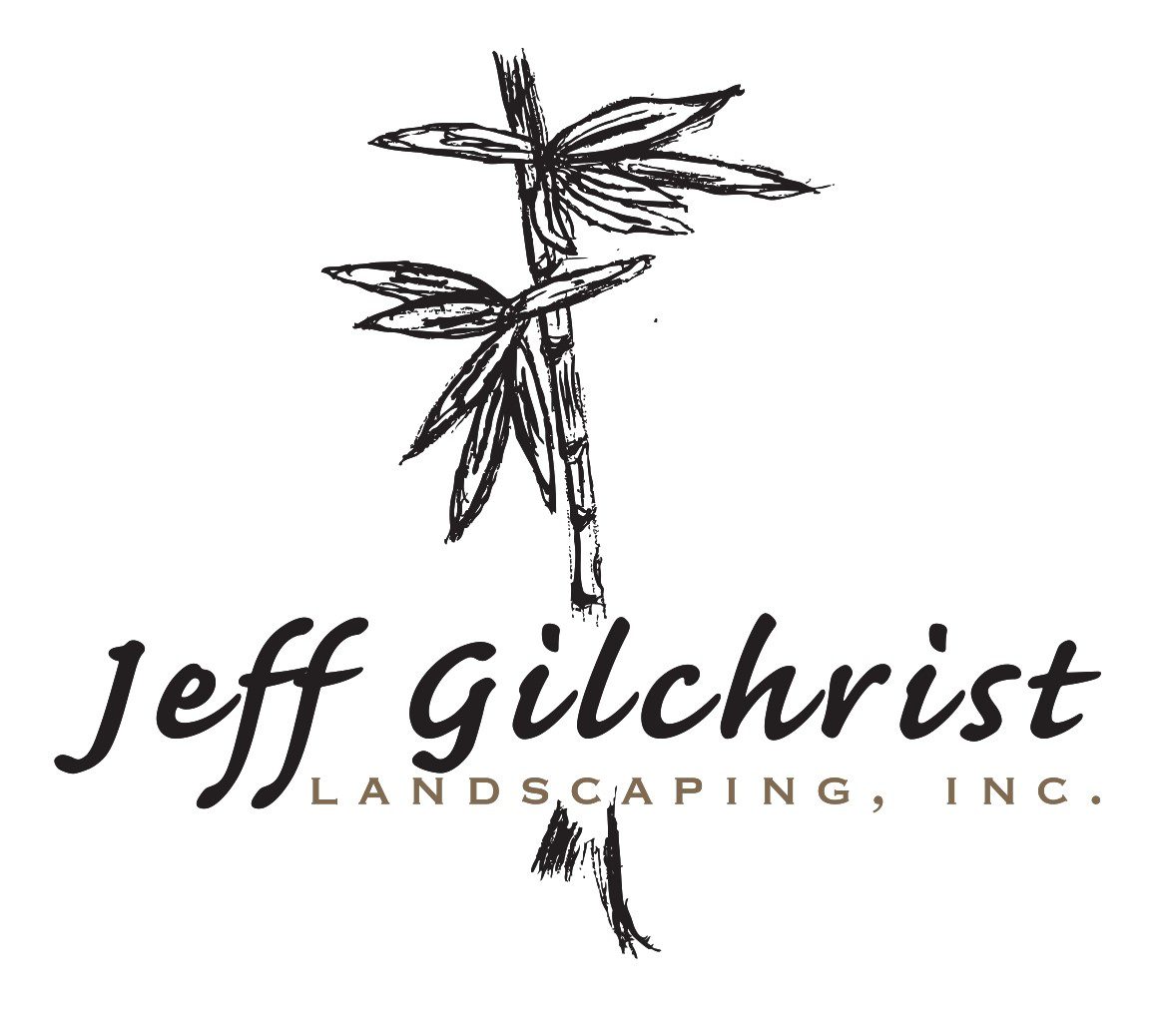 A black and white image of the jeff gilchrist landscaping logo.